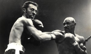 Alan Minter takes a shot from Marvin Hagler during his defeat to the legendary American in September 1980