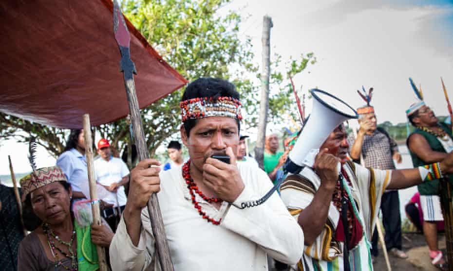 James Chuquival, from the San Jose de Saramuro indigenous community, protesting along the River Maranon in northern Peru.