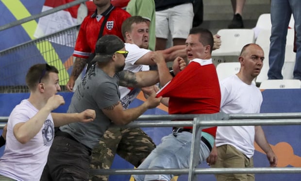 Clashes break out in the stands during the Euro 2016 Group B soccer match between England and Russia.