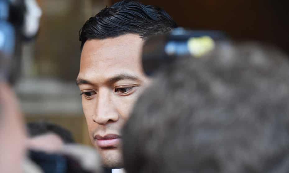 Wallabies star Israel Folau (C) leaves a conciliation hearing at the Fair Work Commission in Sydney, 28 June 2019. 