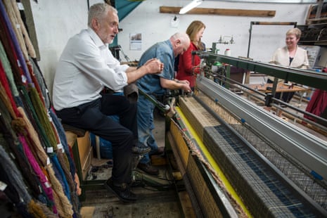 Jeremy Corbyn has a go on a loom at Harris Tweed factory in the Hebrides, 23 August.