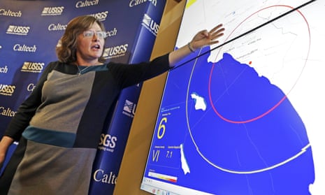 jones holds out hand over map with concentric circles