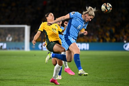 Millie Bright beats Sam Kerr to the ball in the semi-final at Stadium Australia