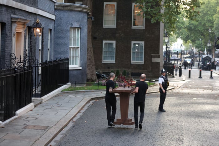 A lectern being brought into the street outside No 10 for Boris Johnson’s speech.