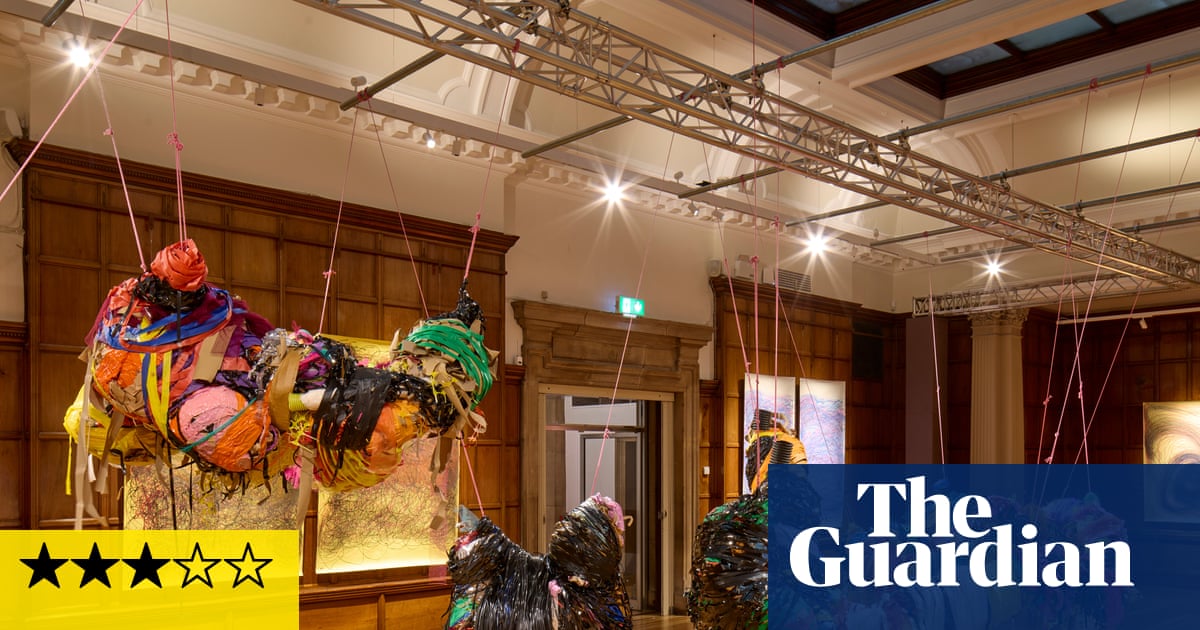 Turner prize 2025 review – puzzling banners, tinkling bells, burning landscapes and bum-like sculptures