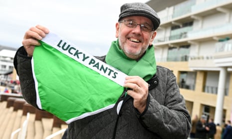 Racegoer Dave Winfield, with his 'Lucky Pants' ahead of racing on day three of the Cheltenham Festival.