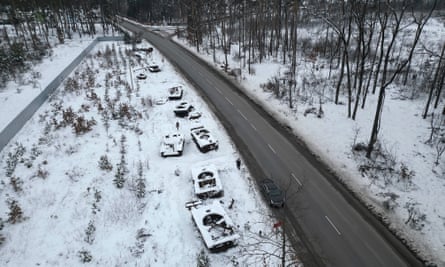 Destroyed Russian military vehicles outside Bucha in snow