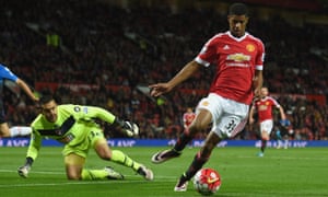 Marcus Rashford is watched intently by Adam Federici.