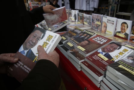 Deemed harmful … books banned on the Chinese mainland on sale in a Hong Kong market last February. Many such titles have now been withdrawn.