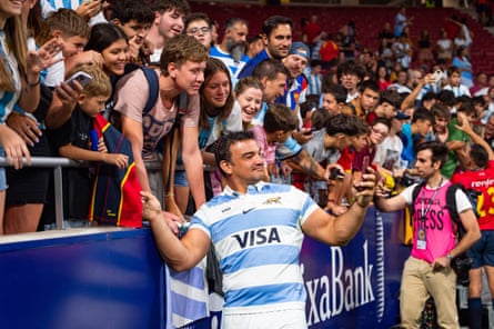 Agustín Creevy takes some selfies with the fans at the end of the match between Spain and Argentina in August
