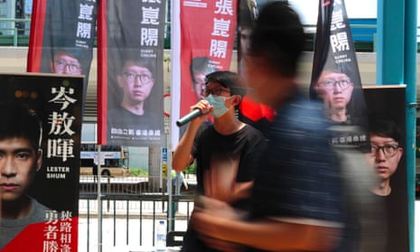 A candidate campaigns during Hong Kong pro-democracy opposition primaries