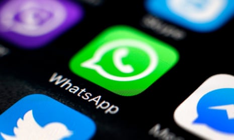 The logo of the messaging application WhatsApp on the screen of a smartphone.