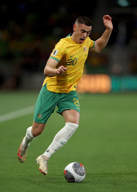 Lewis Miller runs up the wing with the ball