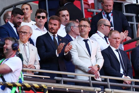 Salford City co-owners David Beckham and Gary Neville look dejected, with former Manchester United colleague Paul Scholes after the final.