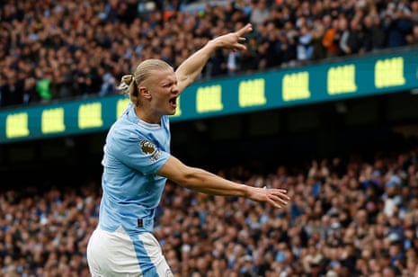 Manchester City's Erling Haaland celebrates scoring their second goal against Brighton.