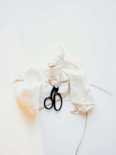 Rabal and Threads Wrapping Scissors, Grey Area, 2021Wrapped in rabal and trailing threads, the scissors are held somewhere between concealment and transformation. The arrangement allows familiar objects to drift away from their assigned uses, opening a search for new forms through which vulnerability and change might appear.