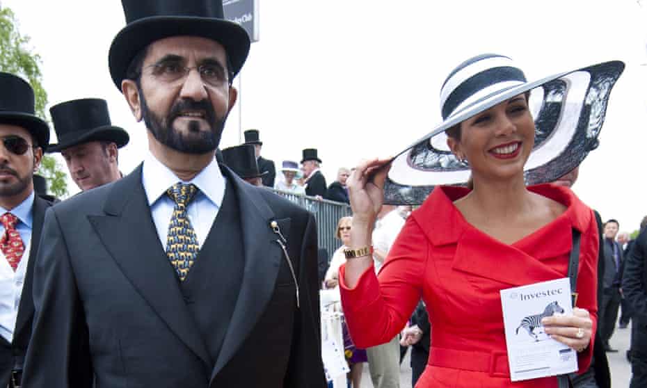 Princess Haya bint Al-Hussein and Sheikh Mohammed bin Rashid al-Maktoum arrive for the Epsom Derby Day at Epsom Downs in June 2013.