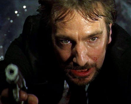 Rickman as Hans Gruber in Die Hard, about to die