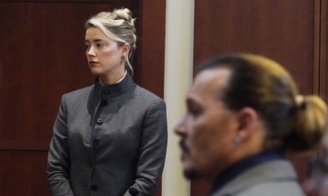 Amber Heard and Johnny Depp in court in Fairfax, Virginia, in May. 