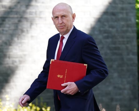 John Healey arriving for a meeting in Downing Street