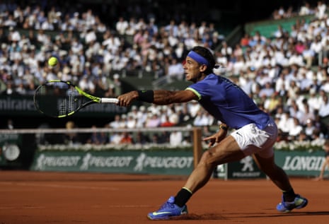 Rafael Nadal stretches to make a return as he takes control of the second set.