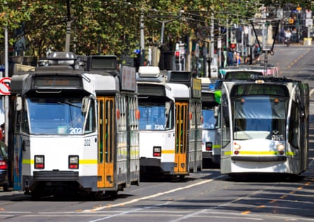 Trams moving along Melbourne CBD’s busy main thoroughfare, Swanston Street.