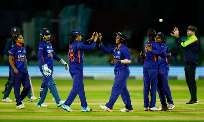 India's Harleen Deol (centre left), Yastika Bhatia (centre right) and team-mates celebrate winning the match.