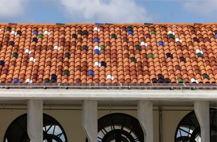 Sparkly interlocking Spanish terracotta roof tiles installed on Bondi Pavilion