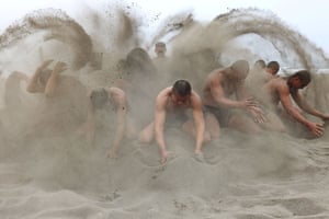 Trainees create a ‘sand storm’ as the morning training concludes