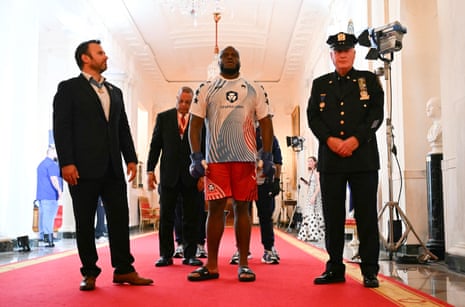 Derrick Lewis, Trump’s personal request for Sunday’s card, makes his entrance ahead of Sunday’s fight.
