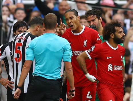 Newcastle v Liverpool: Premier League – live | Premier League 5 Liverpool's Virgil van Dijk reacts after he is shown a red card by referee John Brooks.