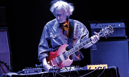 Manuel Göttsching performing live on stage at the Barbican in London in 2017.