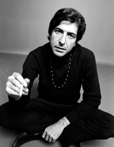 Young Cohen dressed all in black with a bead necklace, with a cigarette