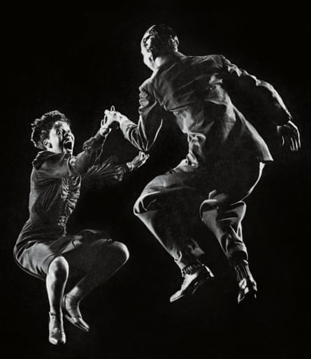 Leon James and Willa Mae Ricker in mid air