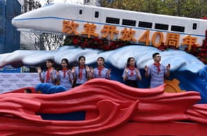Hangzhou, China: a float decorated with a high-speed train marks the 40th anniversary of China’s economic reform as part of a parade in Zhejiang province