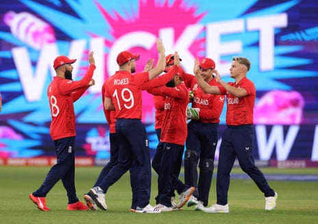 ngland players celebrate following the dismissal of Afghanistan batsman Ibrahim Zadran from the bowling of Sam Curran (right).