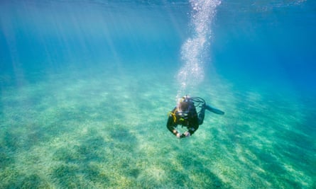Single scuba diving underwater