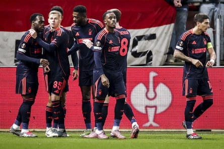 Nottingham Forest’s Arnaud Kalimuendo celebrates with teammates after scoring his team’s first goal against Utrecht.