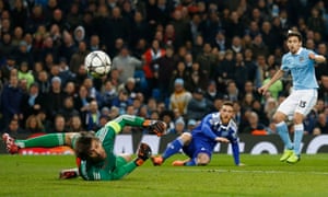 Manchester City’s Jesus Navas hits the post.