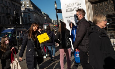 Oxford Circus in London, where shoppers were today making last-minute visits to shops before the lockdown starts tomorrow.
