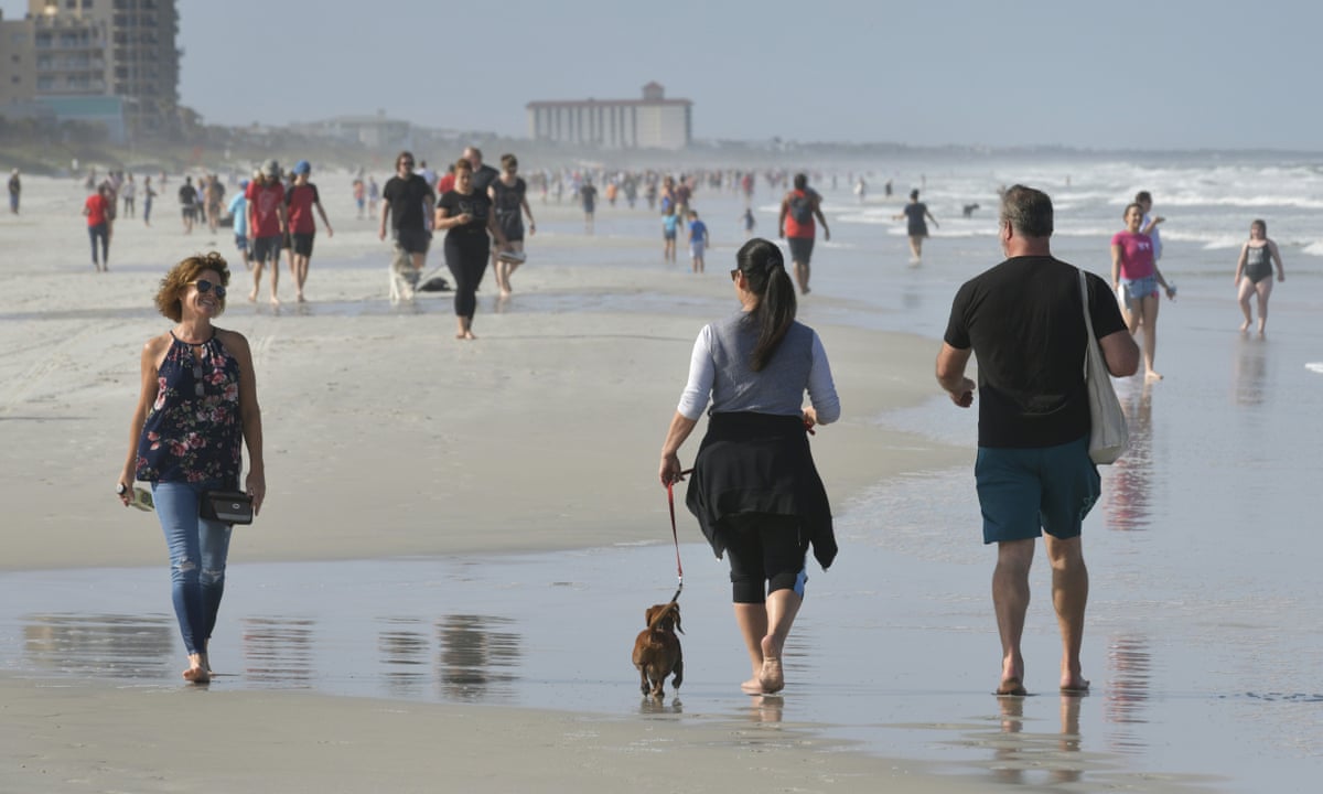 hundreds flock to florida's reopened beaches