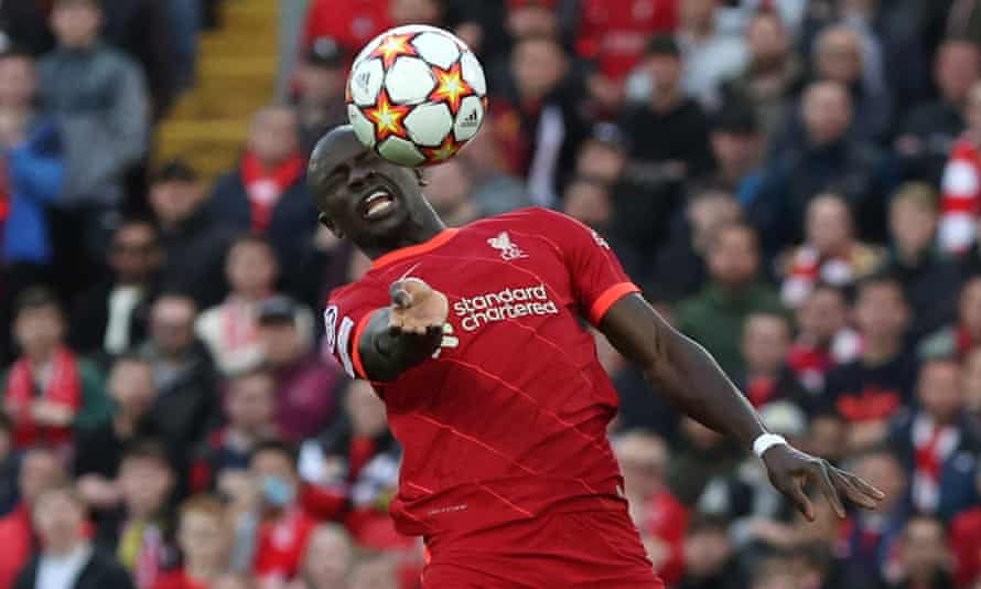 Liverpool's Sadio Mane manages to get his head to the ball but can't direct it on target.