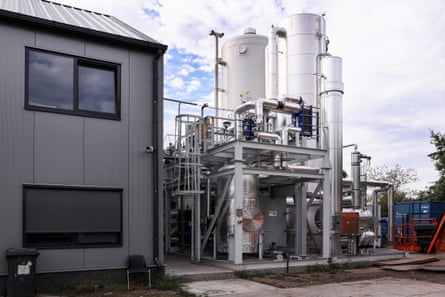 A carbon dioxide capture unit attached to a biomass generator at a greenhouse