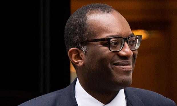 Kwasi Kwarteng leaves 11 Downing Street to deliver his mini-budget.