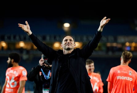 Coventry City manager Frank Lampard celebrates with the fans after the club’s promotion was confirmed with the draw.