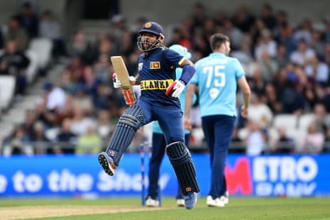 Kusal Mendis jumps as he celebrates