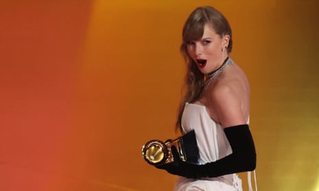Taylor Swift accepts the award for best pop vocal album at the Grammys