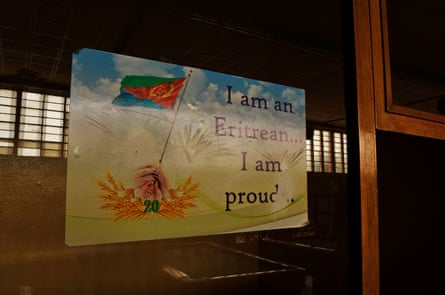 A patriotic poster set on a window in Asmara. Eritrea