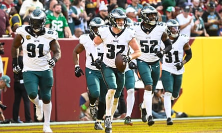 Eagles safety Reed Blankenship celebrates after an interception against the Washington Commanders.