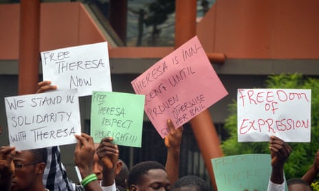 Demonstrators show their support for Theresa Mbomaya, a student detained for disseminating a social media message